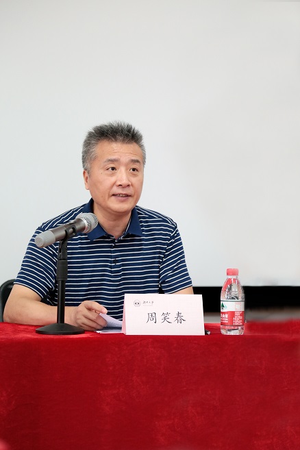 周笑春.jpg 周笑春.jpg
